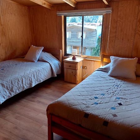 Hostal Y Cabanas Ventisquero Puerto Puyuguapi Esterno foto
