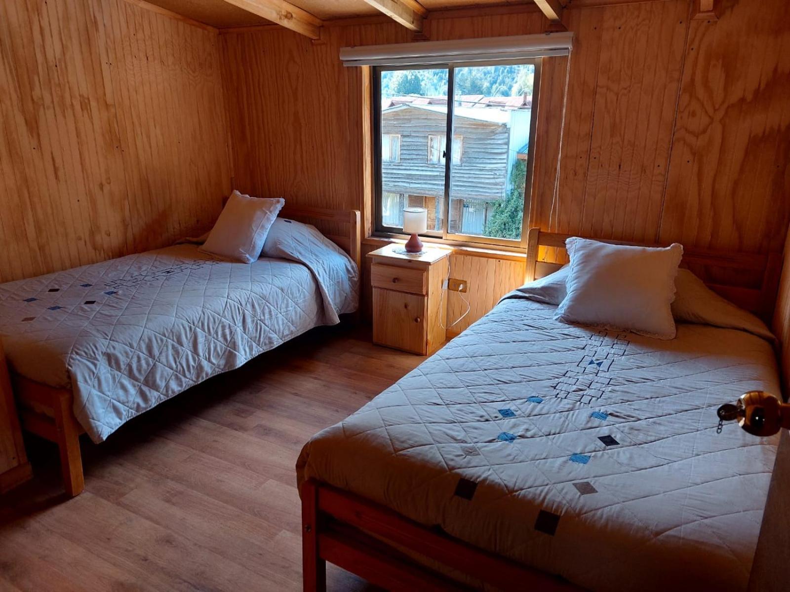 Hostal Y Cabanas Ventisquero Puerto Puyuguapi Esterno foto