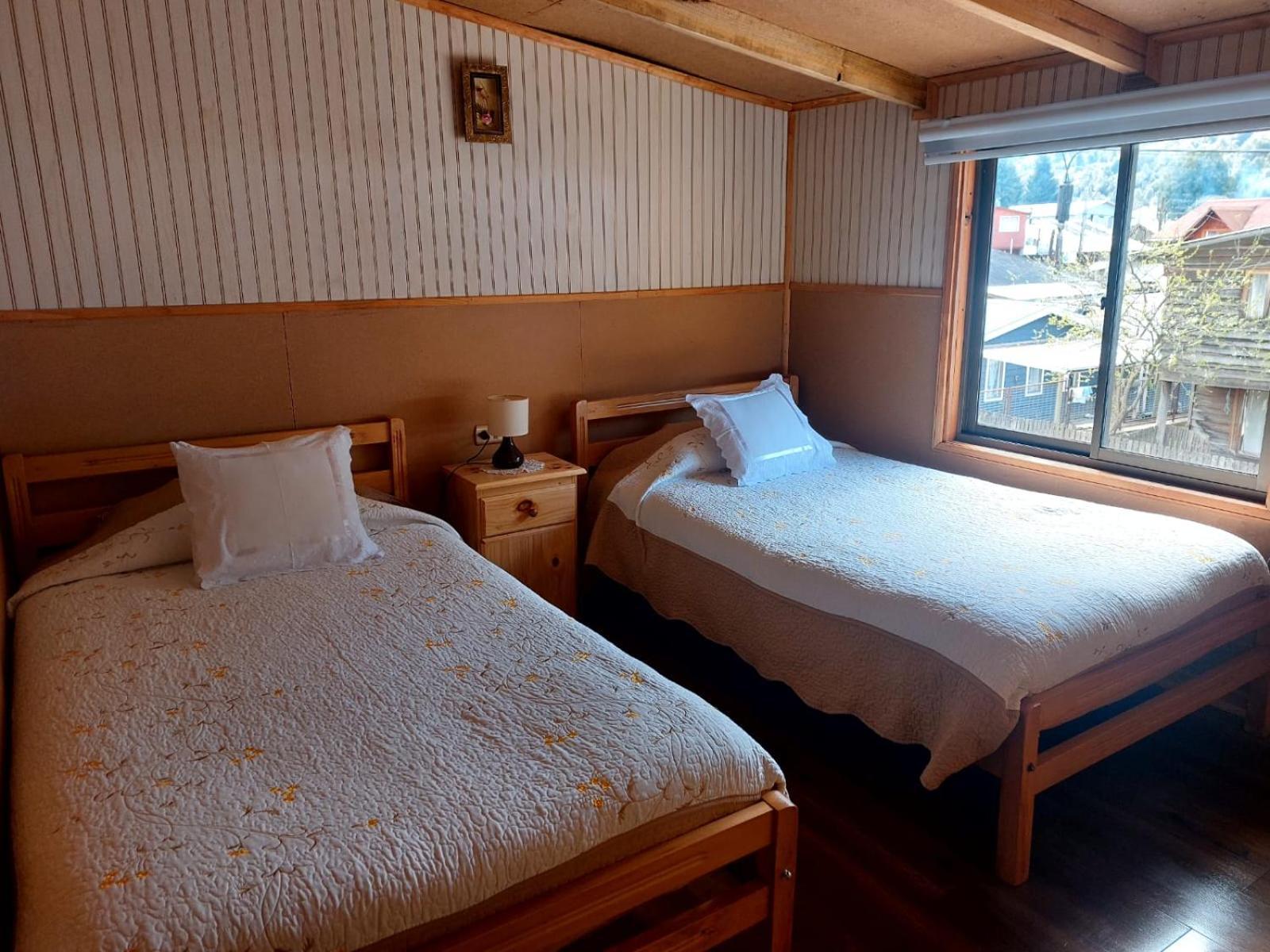 Hostal Y Cabanas Ventisquero Puerto Puyuguapi Esterno foto